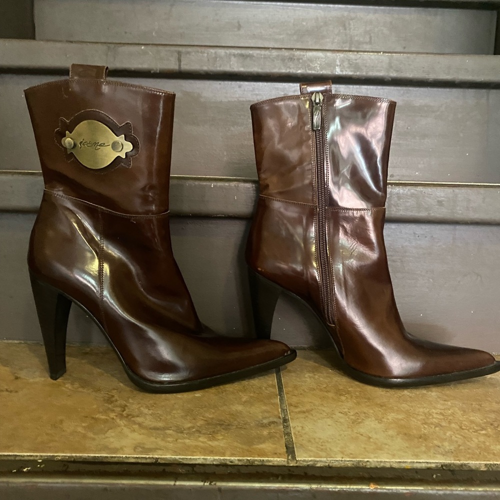 New brown leather mid calf boots. Made in Italy.